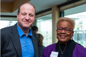 <p style="font-size: 15px">CO Social Action: Governor Jared Polis and ECCBN President at CO Black Caucus Event 2019<p style="font-size: 10px">Photo courtesy of McBoat Photography